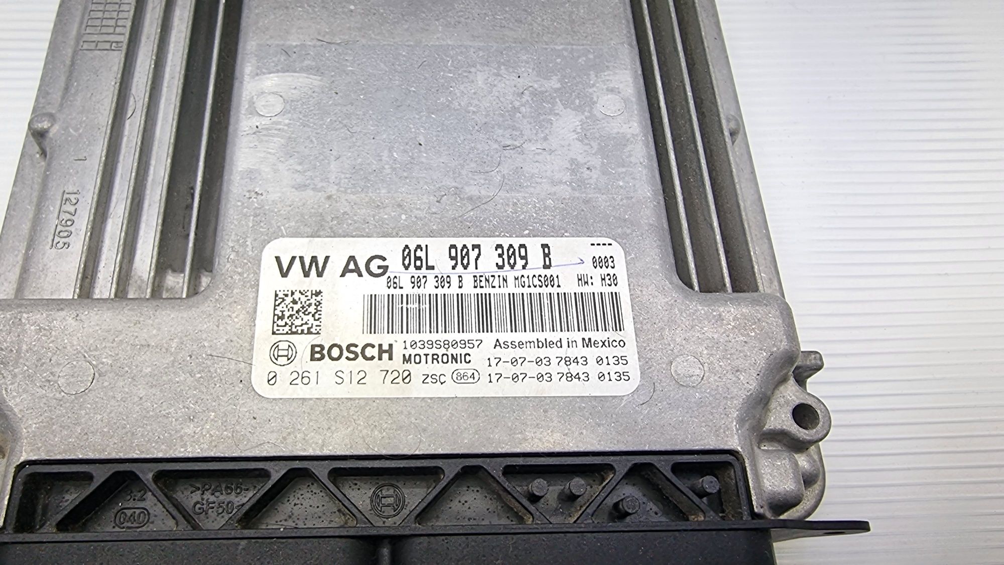 Блок управления VW AG 06L907309