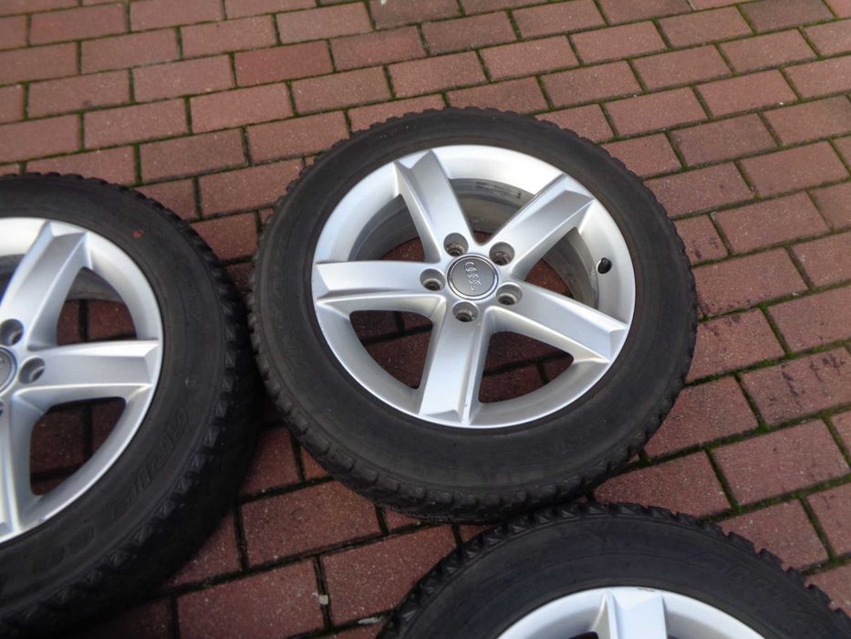 Alufelgi 16 Audi A4 B8 A6 C7 z oponami zimowymi 23r 7/8mm ORG