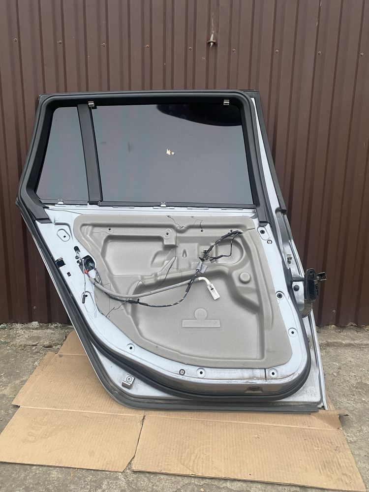 Drzwi lewe lewy tył e61 przedlift silbergrau a08