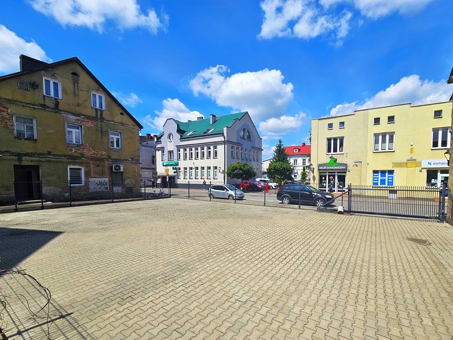 Miejsce postojowe na zamkniętym parkingu w centrum miasta