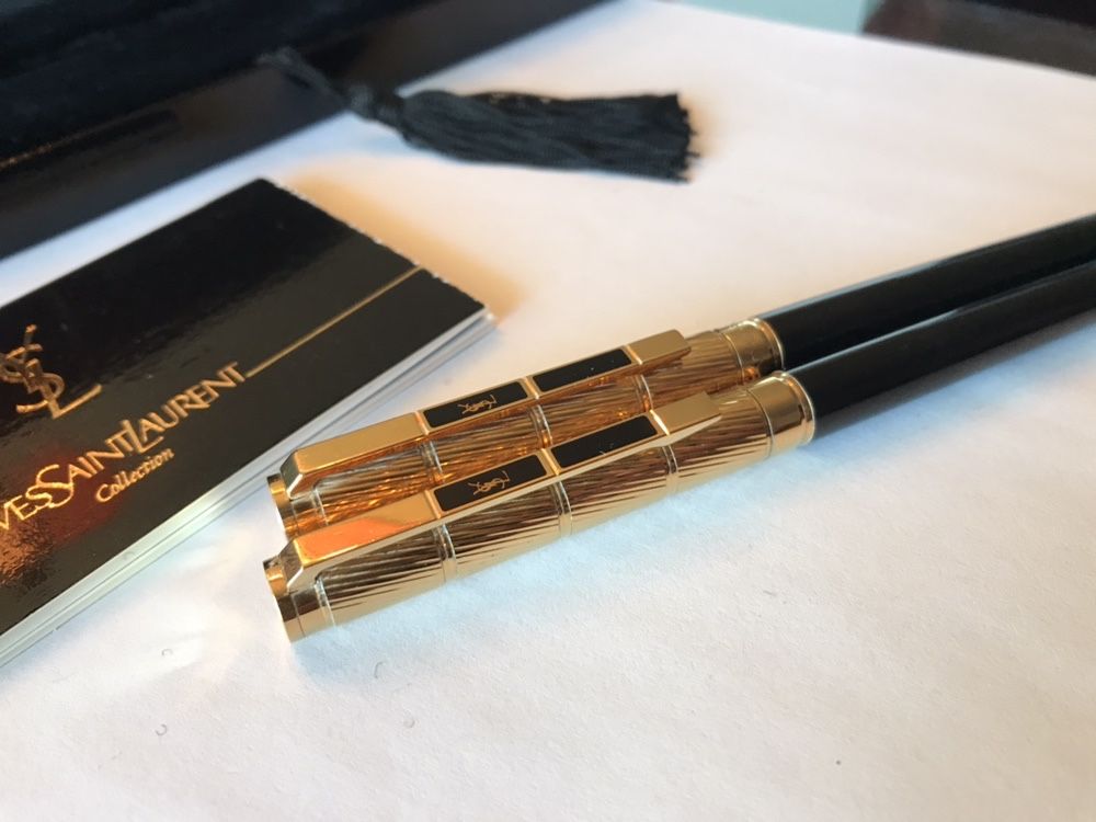 Conjunto de canetas Yves Saint Laurent douradas e pretas