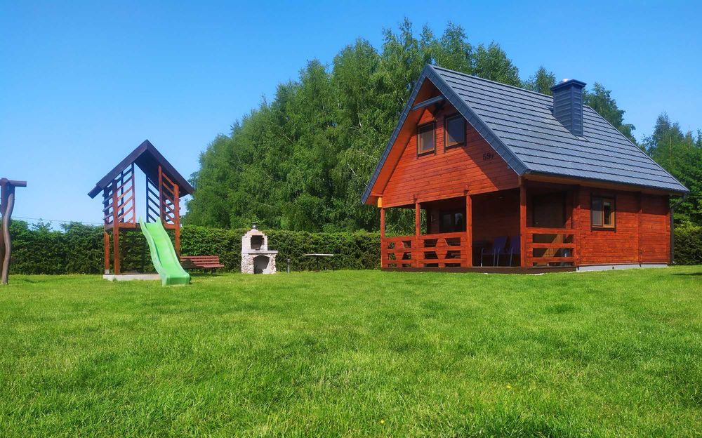 Drewniany domek nad jeziorem do wynajęcia