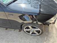 Błotnik prawy BMW e81 schwarz 668