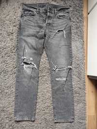 Jeansy z dziurami slim regular waist tapered leg H&M Denim 32/32 175