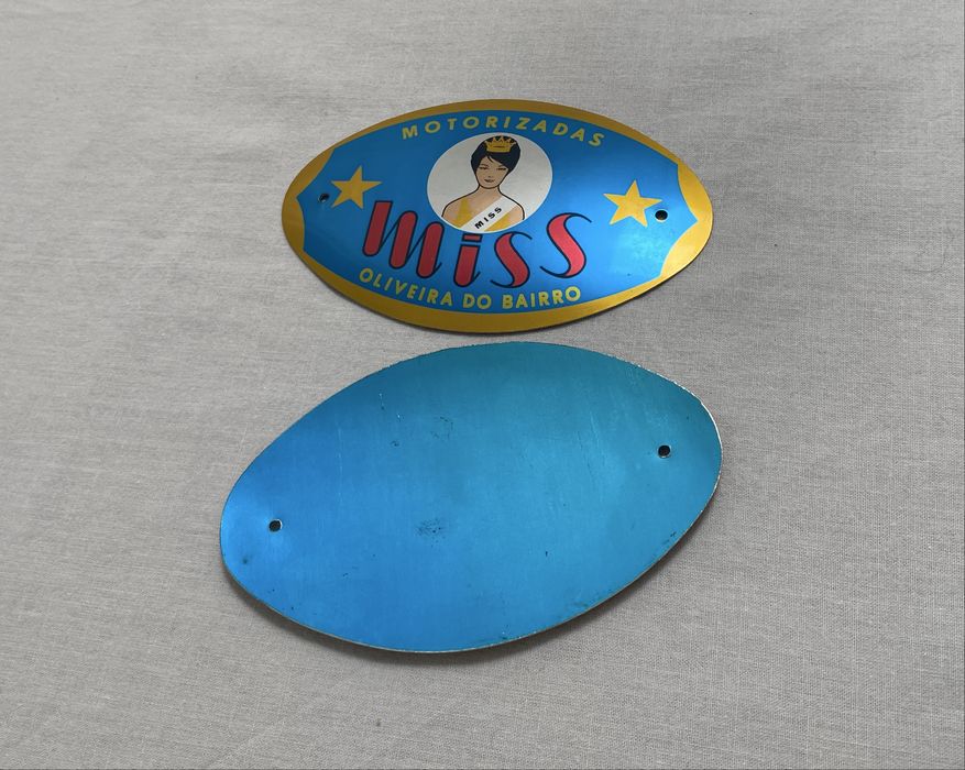 Simbolos emblemas do depósito motorizada Miss Oliveira do Bairro