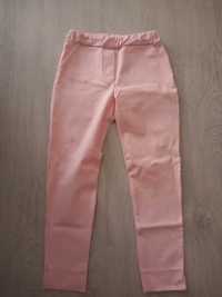 Różowe spodnie na gumce na 140