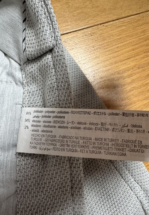 Męskie spodnie chinosy Zara roz. 44