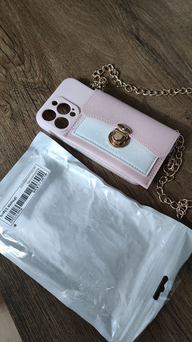 Nowe śliczne etui do iPhone 13 pro z odpinanym łańcuszkiem .