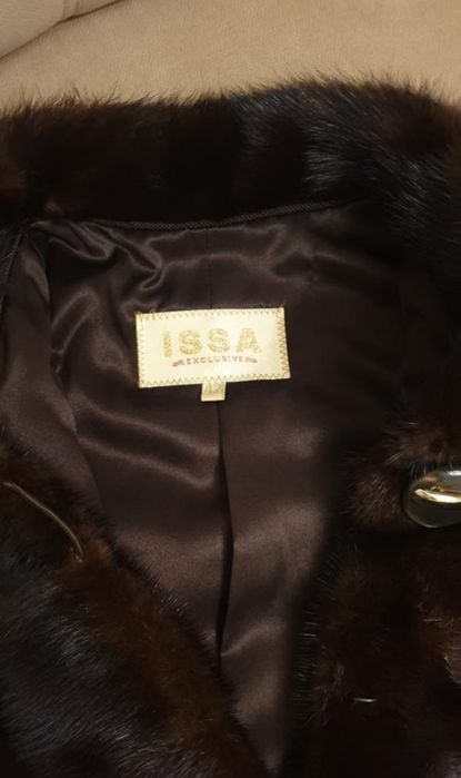 Норкова шуба шоколадного кольору