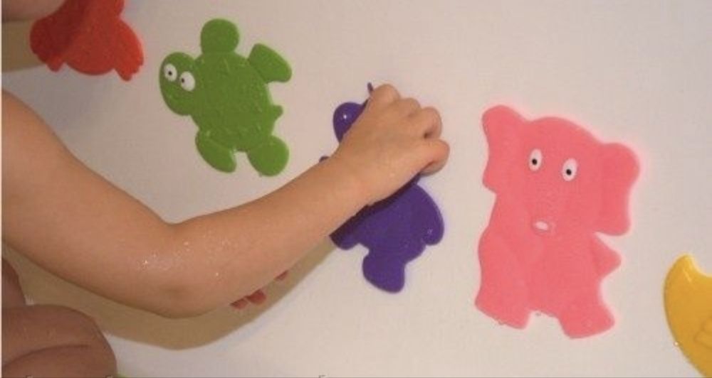 Антиковзні килимки для купання