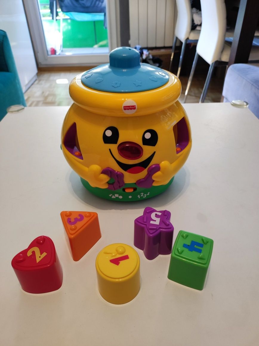 Fisher Price garnuszek na klocuszek