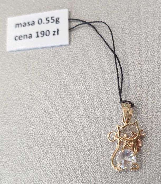 Złoty wisiorek pr.0.585 waga 0.55 g nowy
