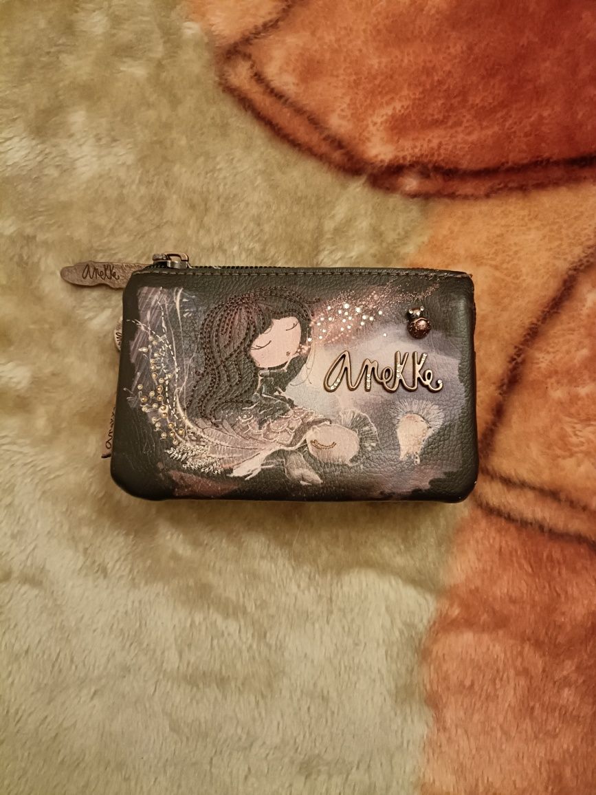 Porta moedas teiplo anekke