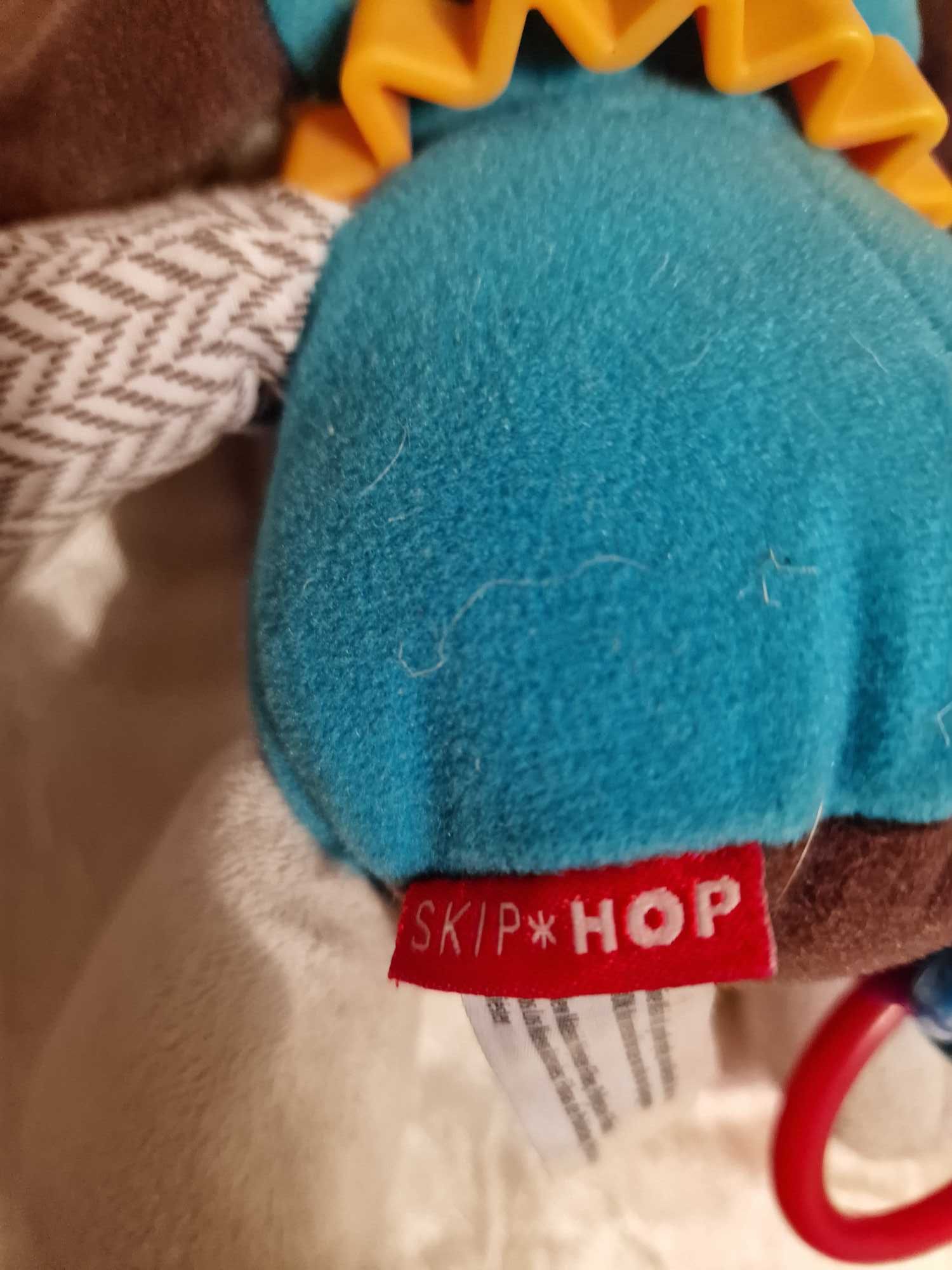 Słonik zabawka sensoryczna Skip Hop zawieszka edukacyjna grzechotka