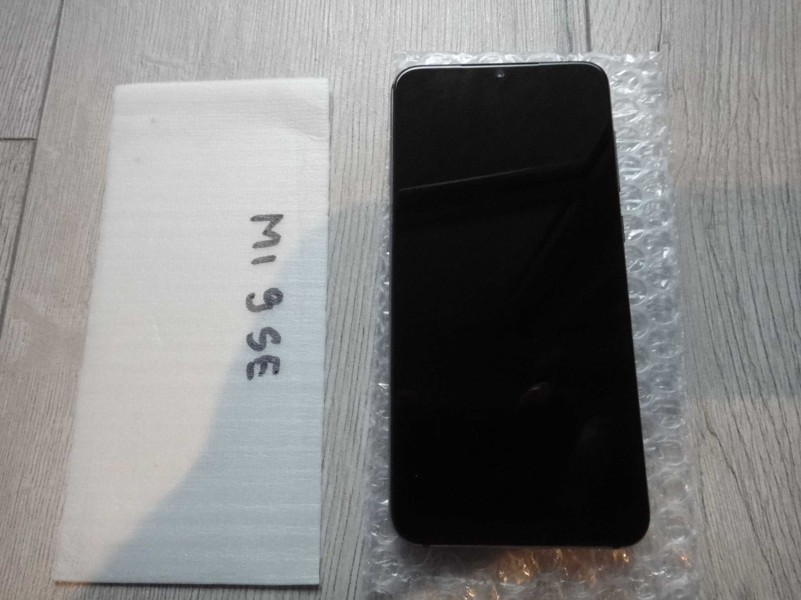 Xiaomi Mi 9 SE  128/6 Gb.