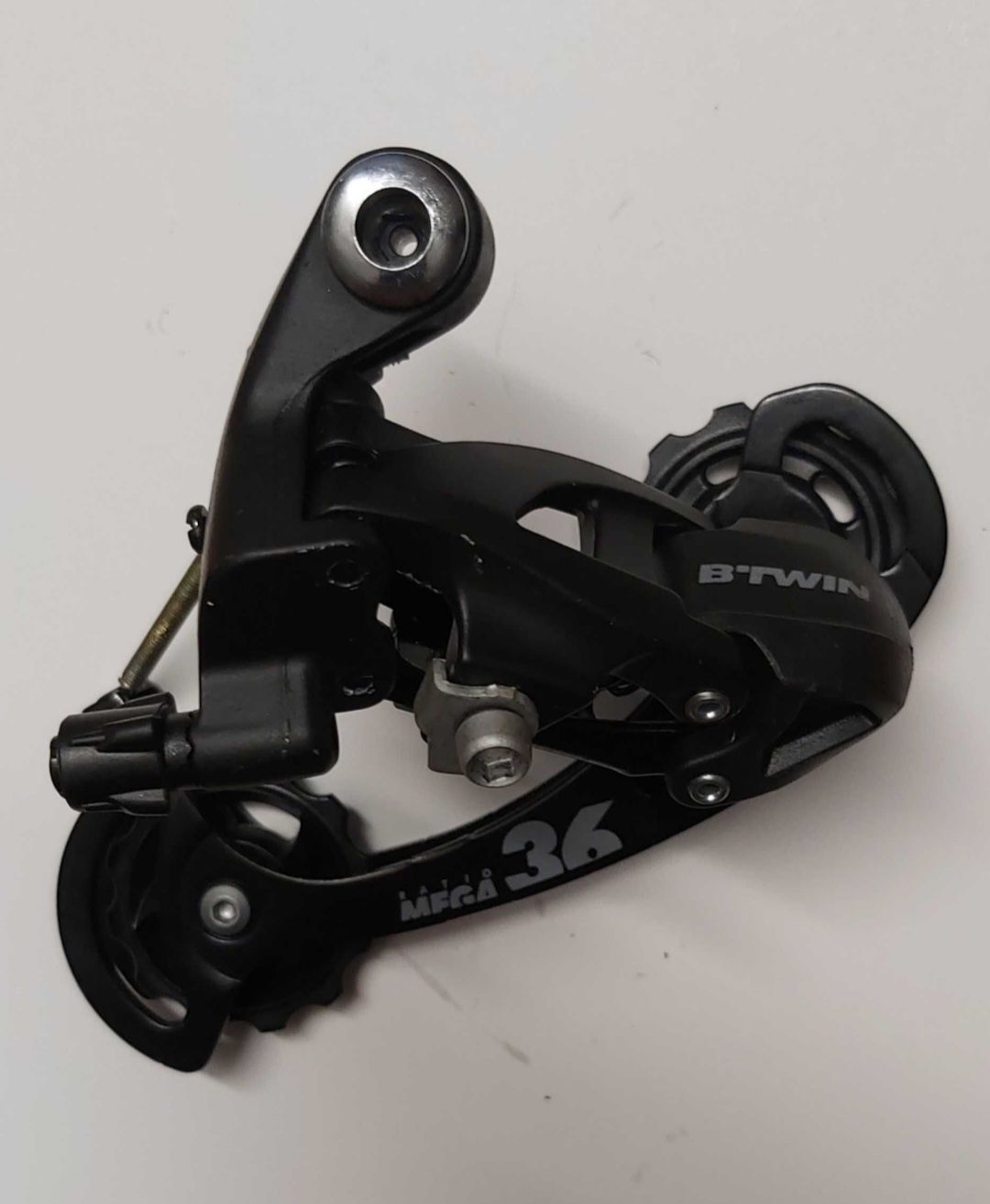 Przerzutka tylna ROCKRIDER BTWIN 7,8,9-rzędowa, solidna aluminiowa.