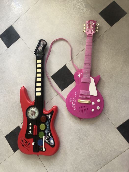 Рок гітара, інтерактивна іграшка. Все працює, музика, світло, струни