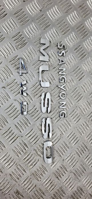 Ssangyong Musso Emblemat Klapy Bagażnika