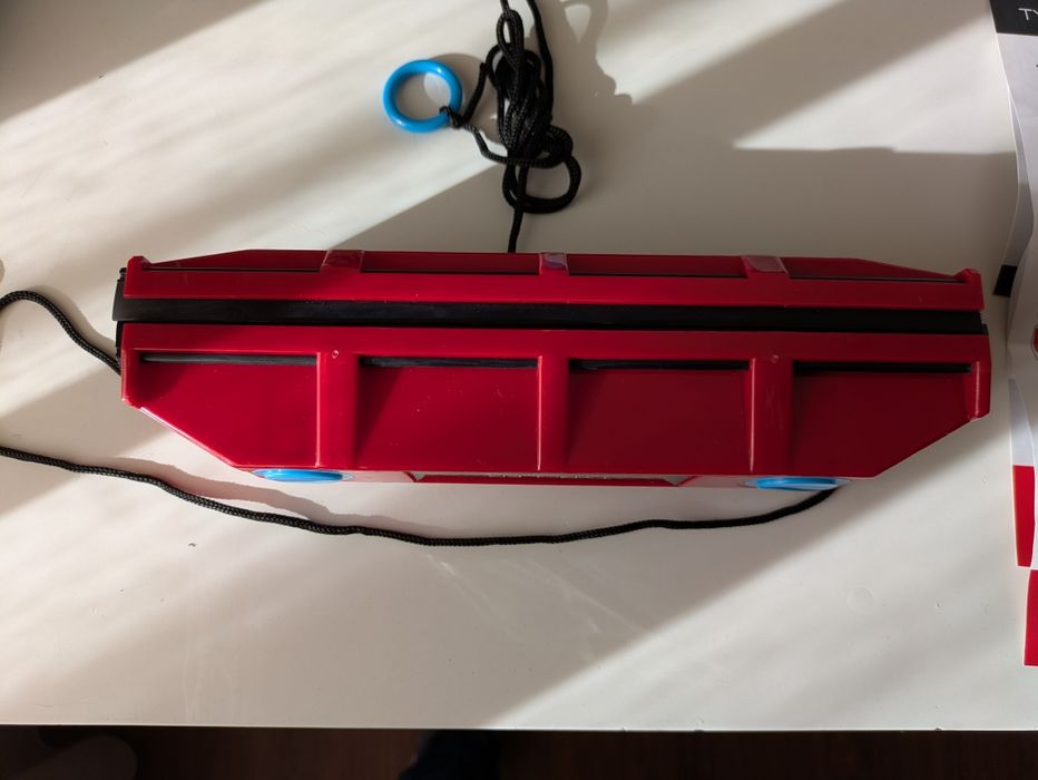 Tirolês magnético para limpar vidros
