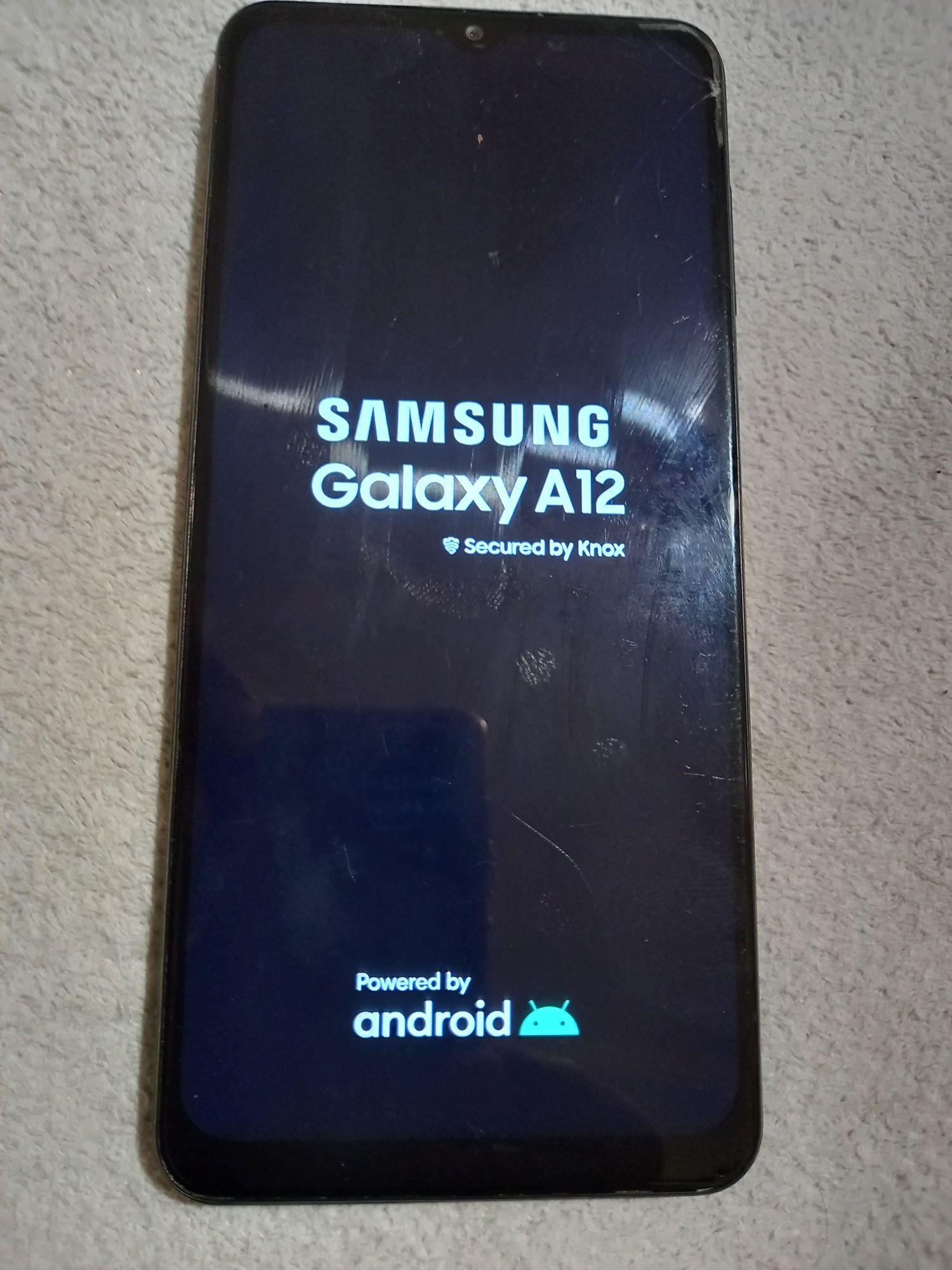 Samsung galaxi A12  32gb semi usado