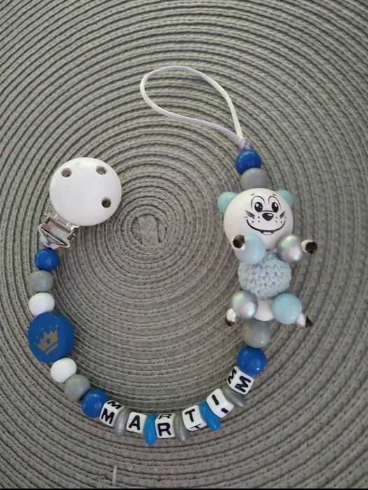 Prendedores de chupeta e porta chaves