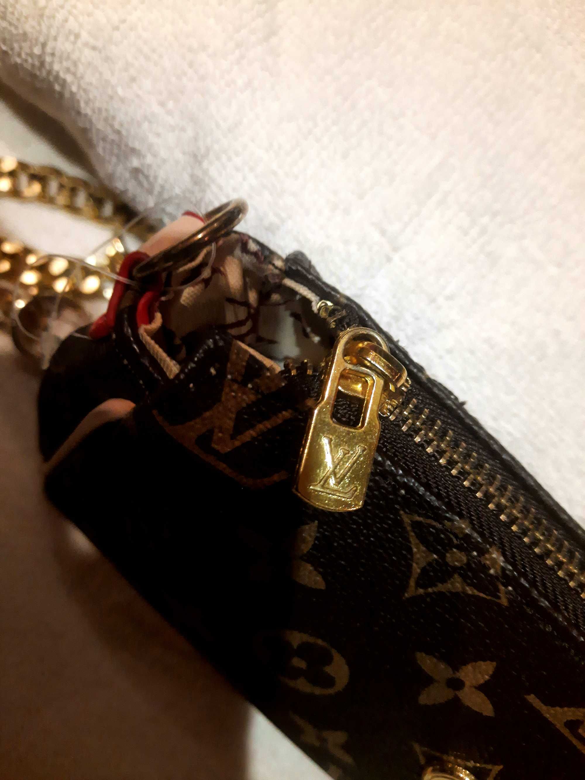 Louis Vuitton Paris  Eva Clutch