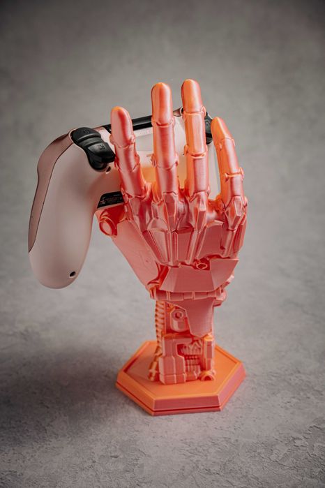 Zmiennobarwna Robo-ręka Cyberpunk - Holder na pady - Różowo-złota