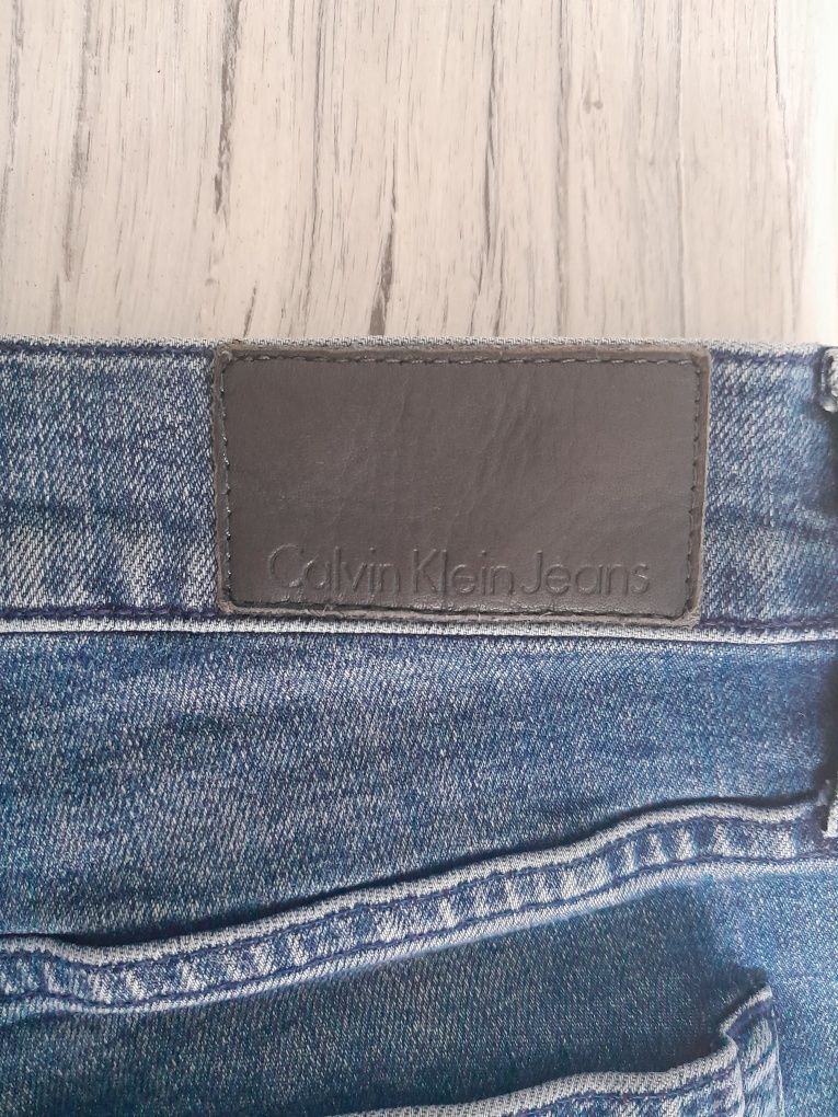 Dżinsy jeansy dzwony damskie Calvin Klein