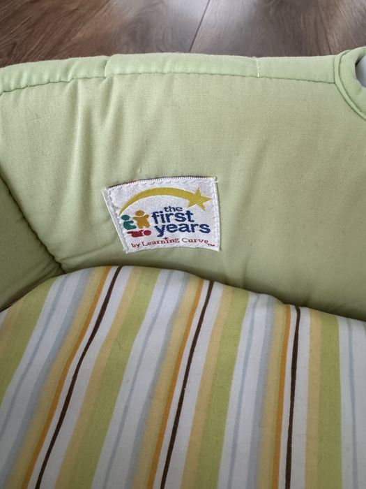 Przenośne łóżeczko, dostawka, przewijak The First Years