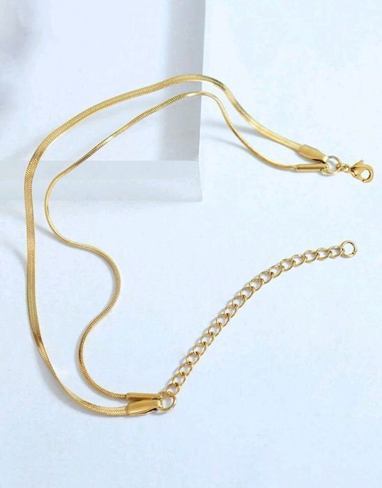 Pulseira dourada em aço