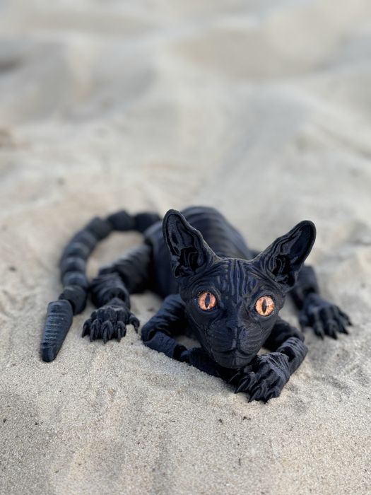 Рухомі фігурки котів сфінксів з 3D-принтера