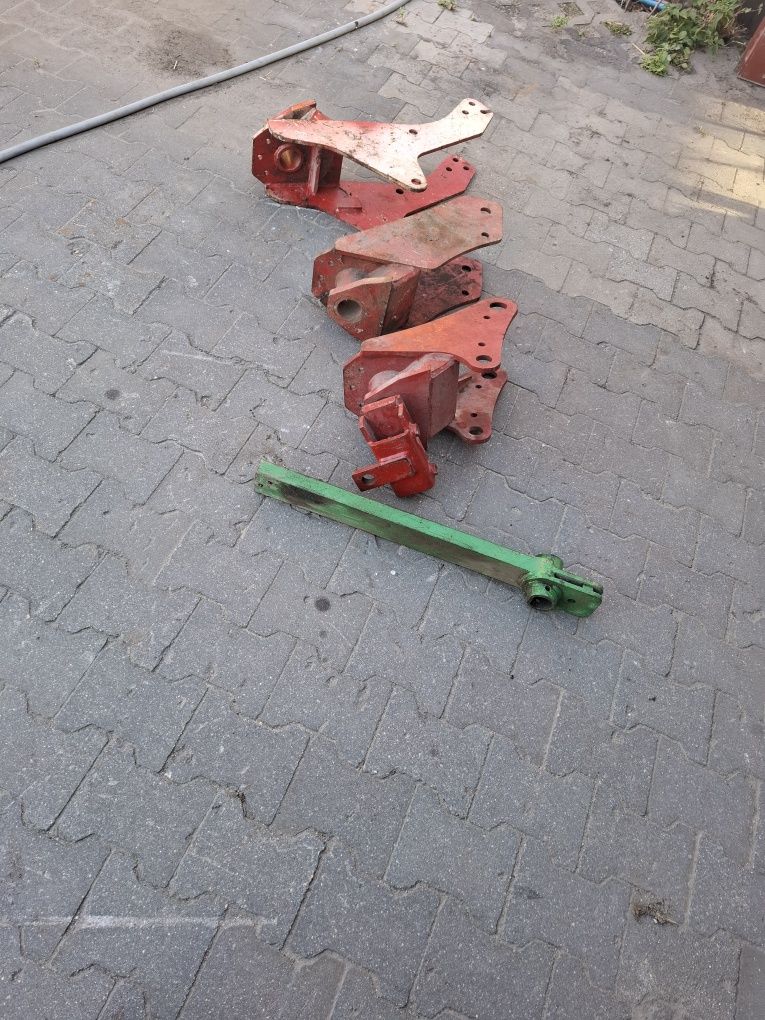 Mechanizm koła podporowego do pługa obrotowego ośka piasta