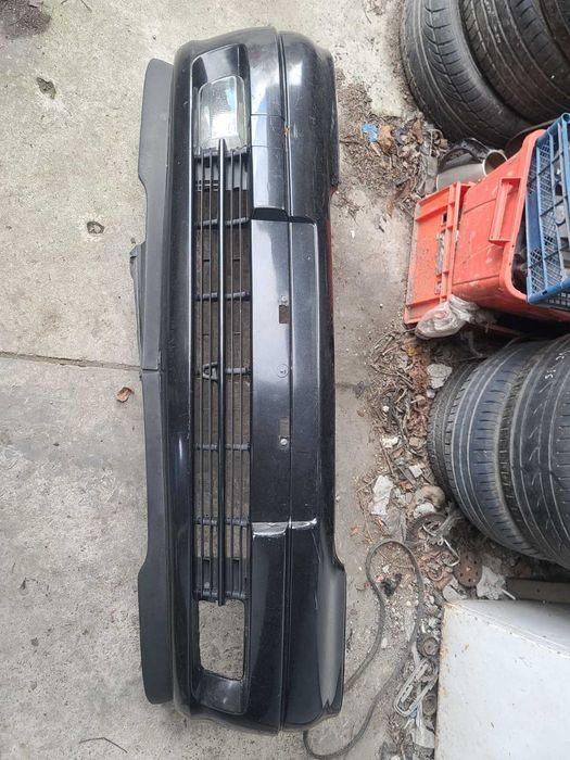 Бампер передній 90559473 Opel Astra G