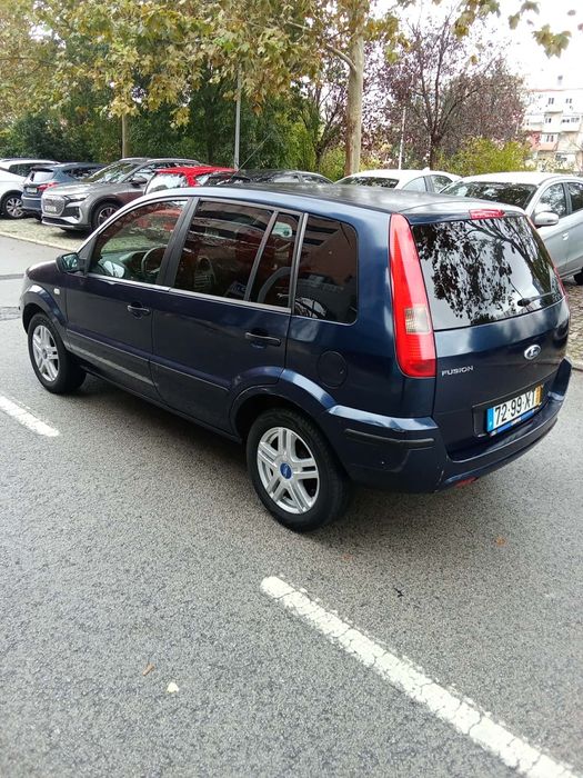 Ford Fusion guia 1.4 16v ano 2004 AC