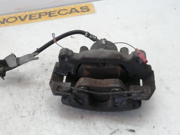 Pinça travão / maxila de travão frente esquerda VOLKSWAGEN Golf V (1K1