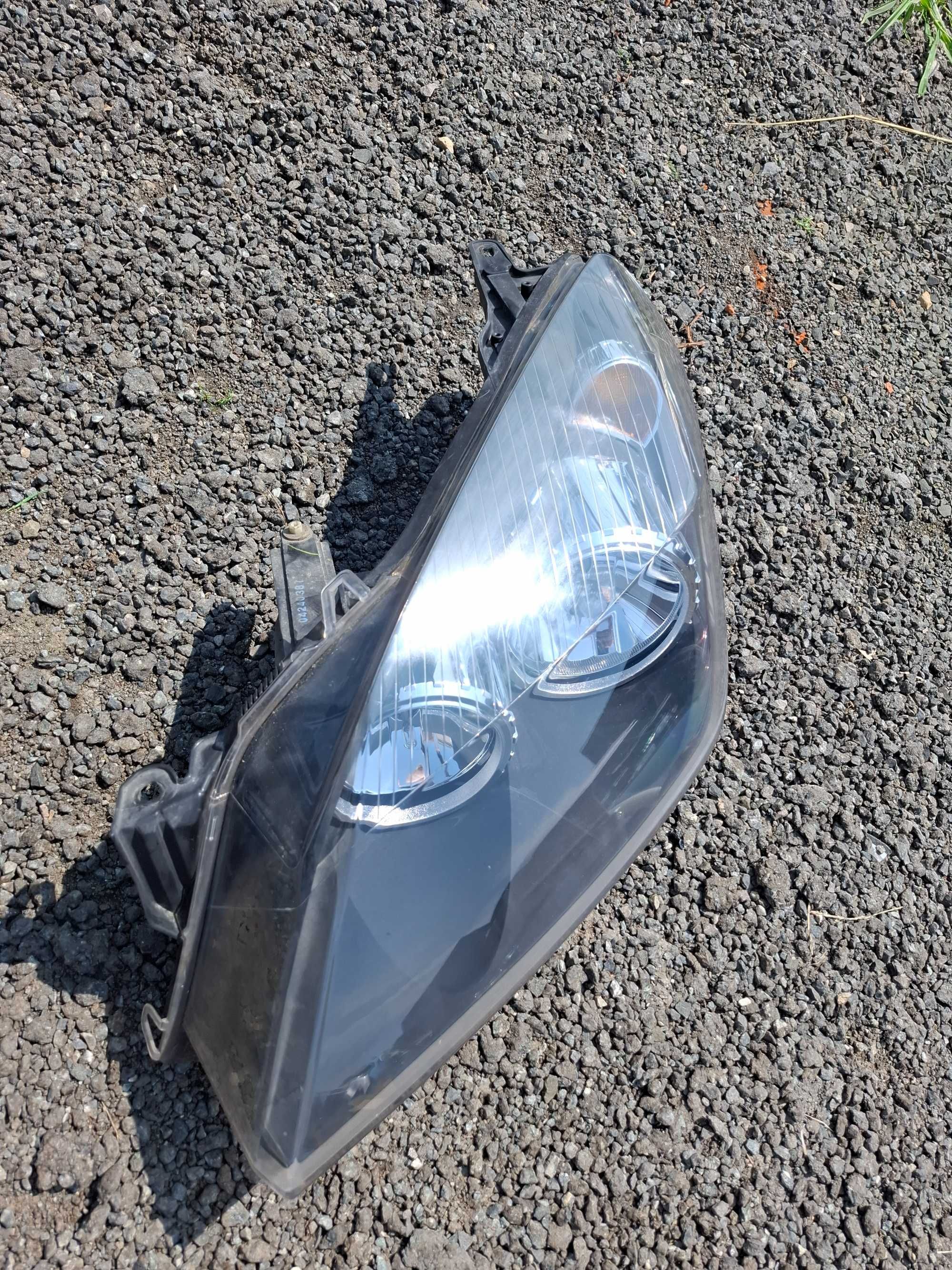 Reflektor lewy przód Opel Astra H