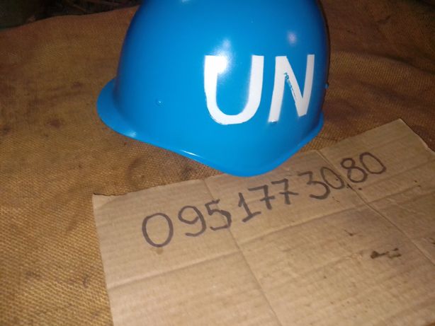 Голубая каска миротворца шлем ООН  .