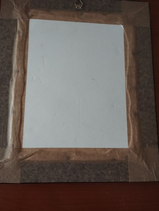 Quadro bordado e porta retratos