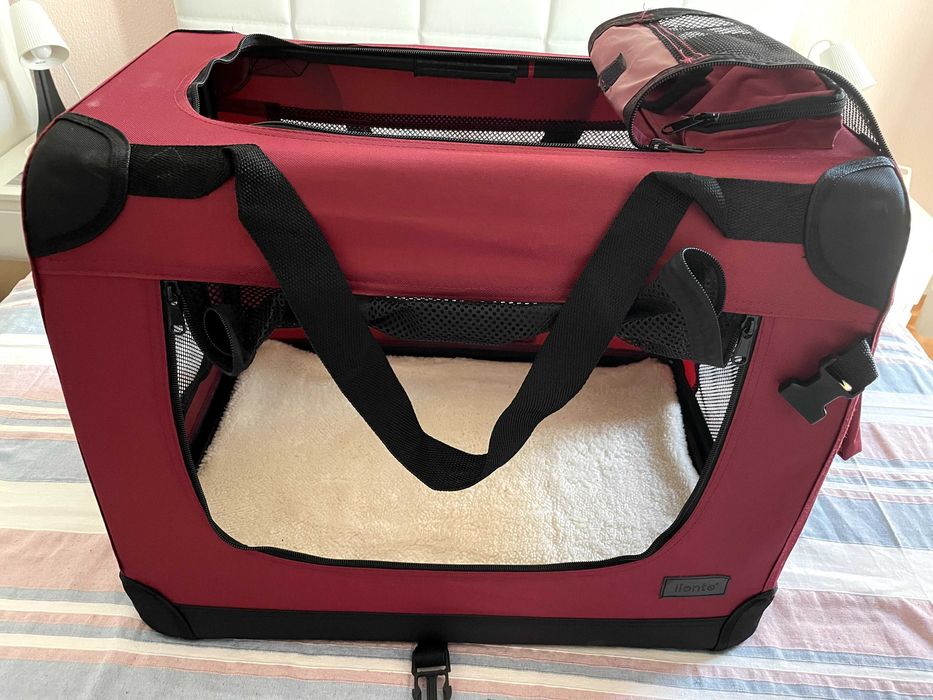 Caixa para transporte de cães.