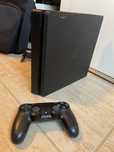 Playstation 4 com Mochila + 3 jogos