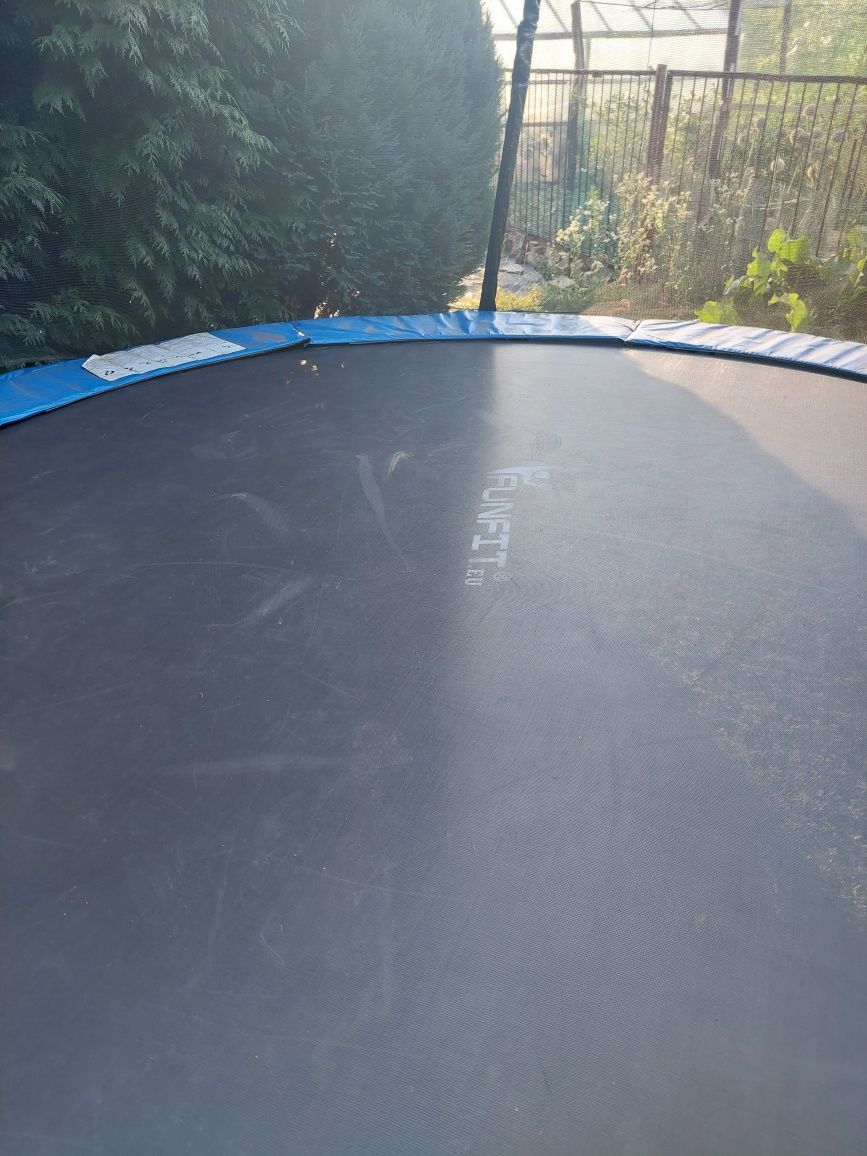 Trampolina stan bardzo dobry,  312 cm .