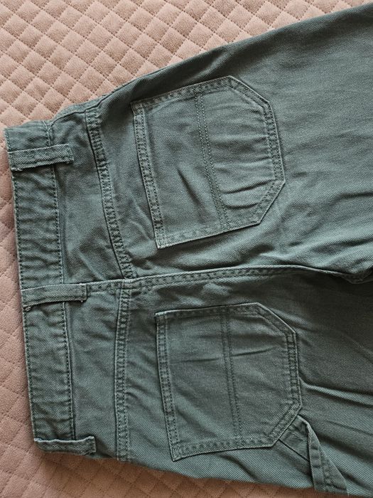 Fajne zielone jeansy H&M Divided -  r. 32