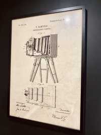 Plakat w ramie -aparat fotograficzny patent