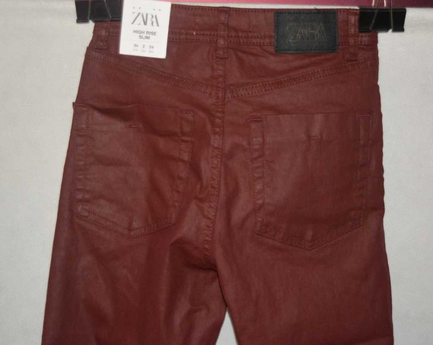 Woskowane jeansy Zara 34