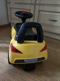жовтий толокар машина дитяча з багажником резинові колеса