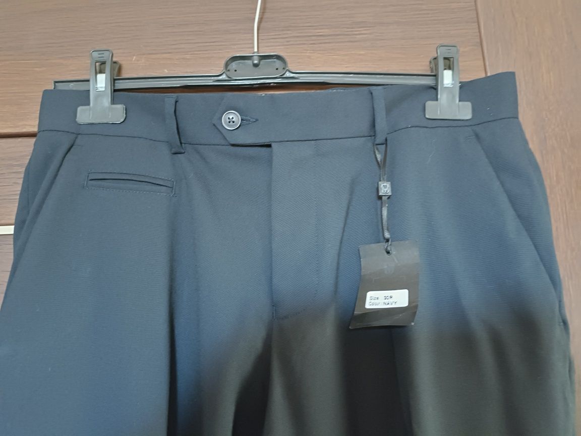 Nowe spodnie męskie garniturowe Steel & Jelly r.L