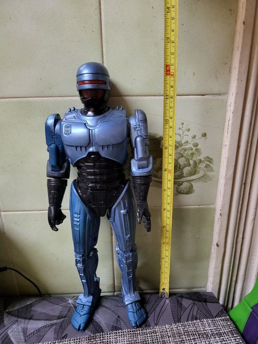 Boneco antigo articulado robocop que fala