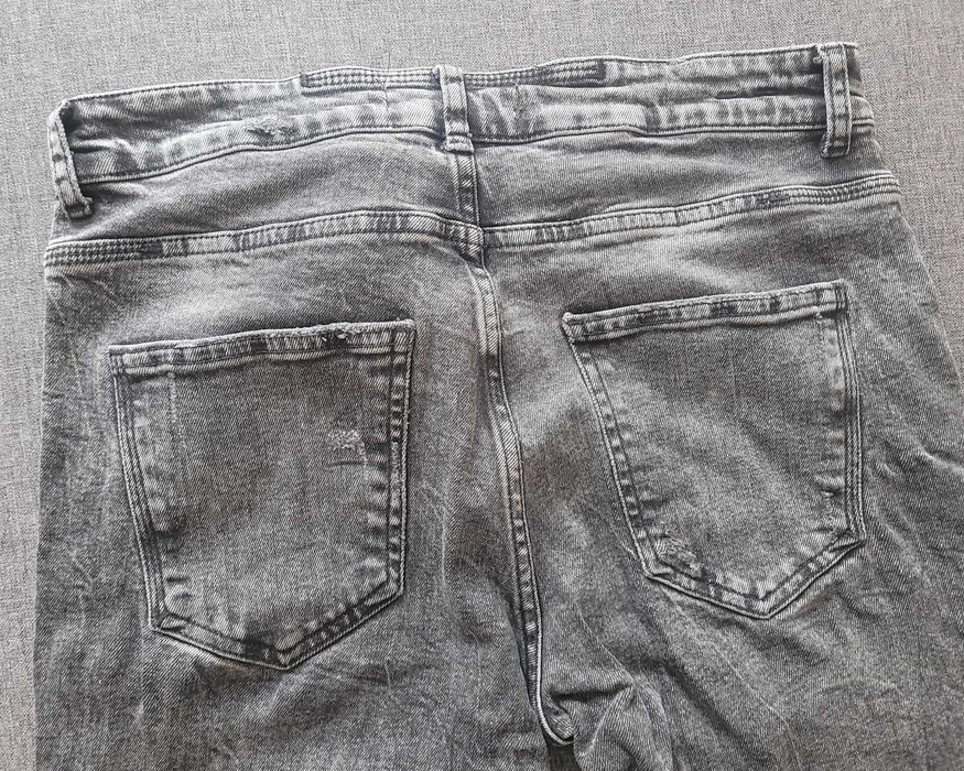 Spodnie jeans spodnie dżinsowe Zara 42 z rozdarciami