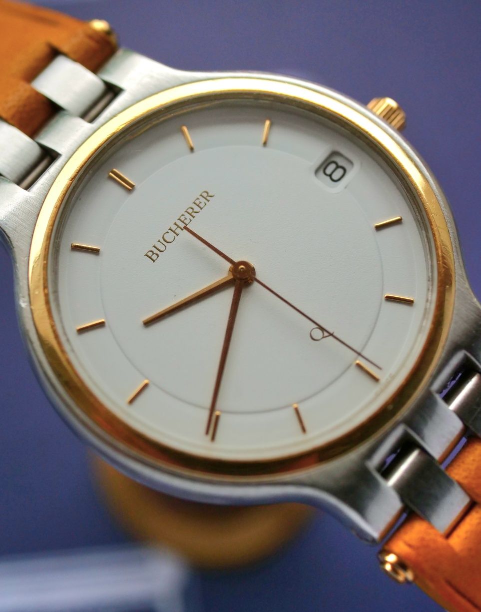 Bucherer zegarek szwajcarski swiss made kwarcowy stal zloto