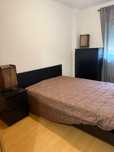 Cama Ikea preta com colchão